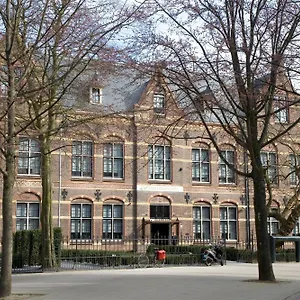 Отель The College Amsterdam, Autograph Collection Амстердам
